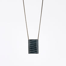 shield ostrich grey brass necklace #1
